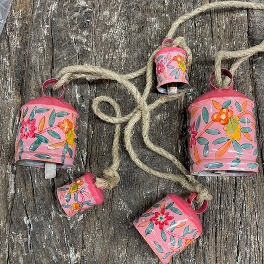 Vintage brass cow bell set 5 on rope floral pink