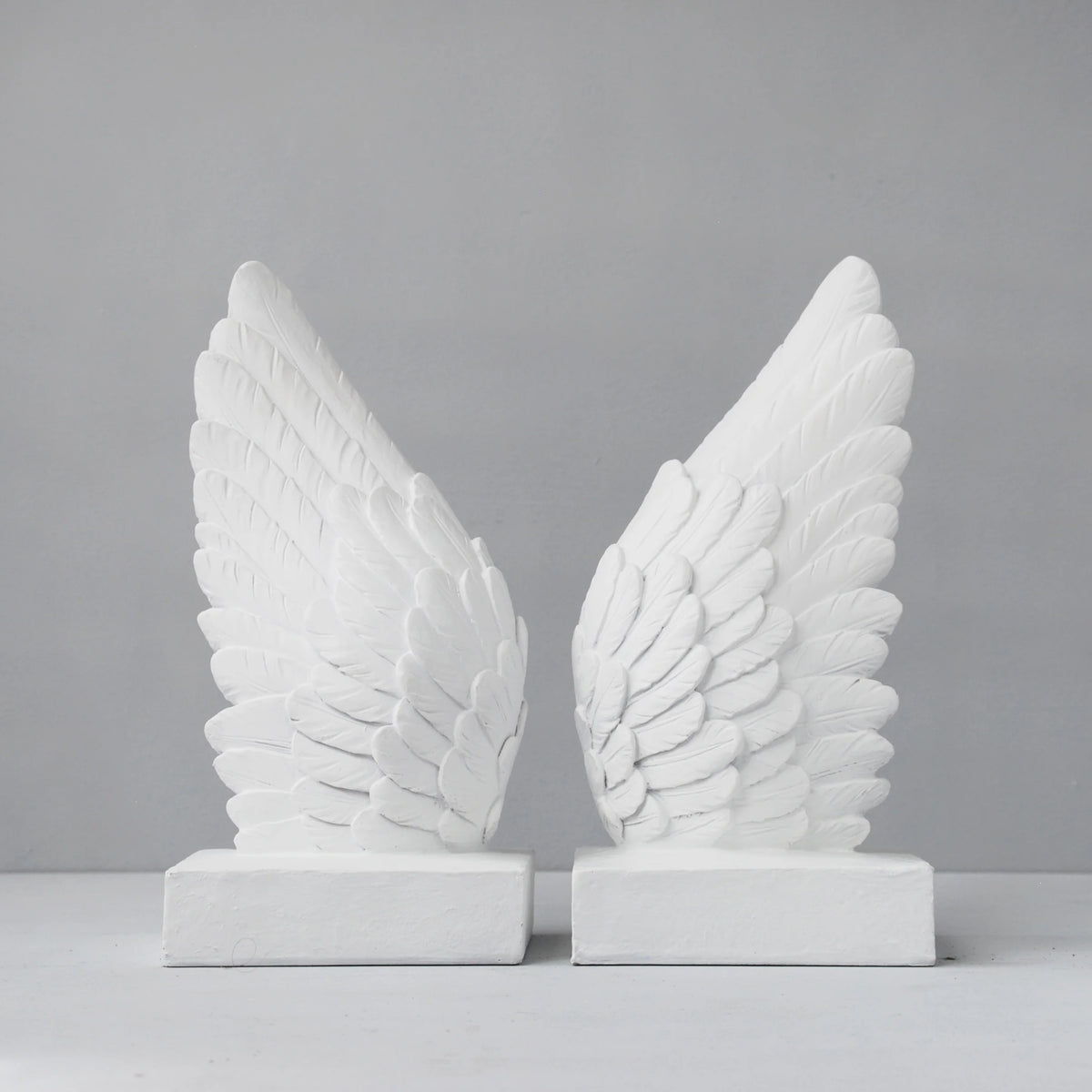 Angel wings bookends statue