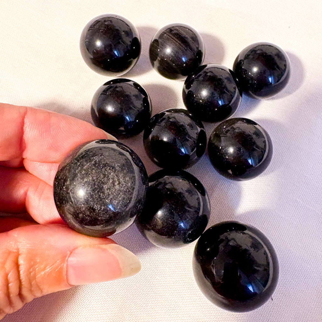 Silver sheen obsidian sphere