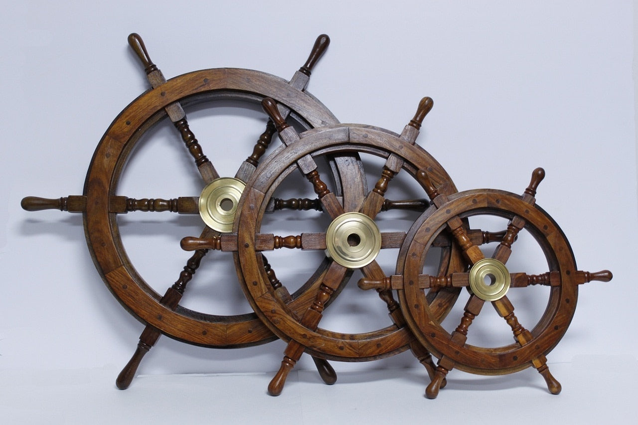 Antique coastal decor boat wheel brass & wood statue