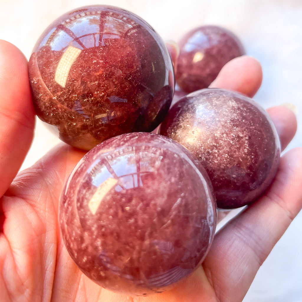 Strawberry quartz crystal sphere