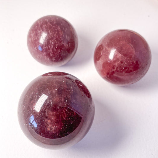 Strawberry quartz crystal sphere