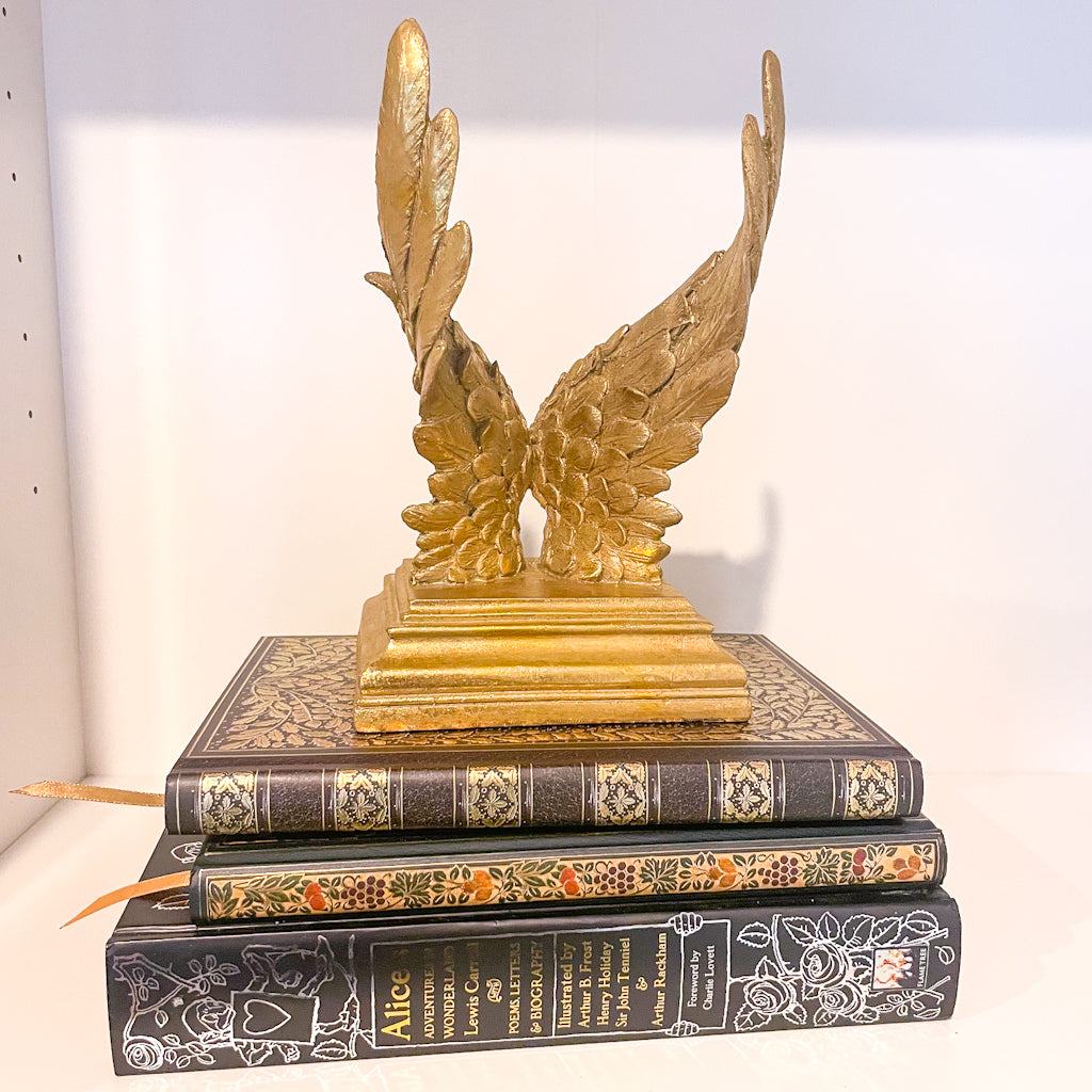 Majestic gold wings bookend statue