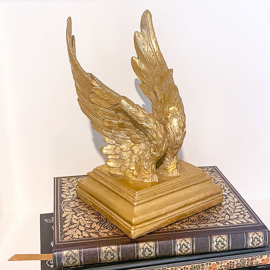Majestic gold wings bookend statue