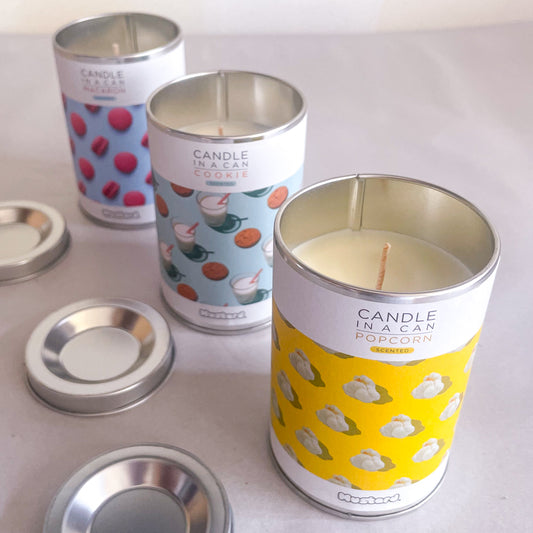 Yummy candle in a tin can