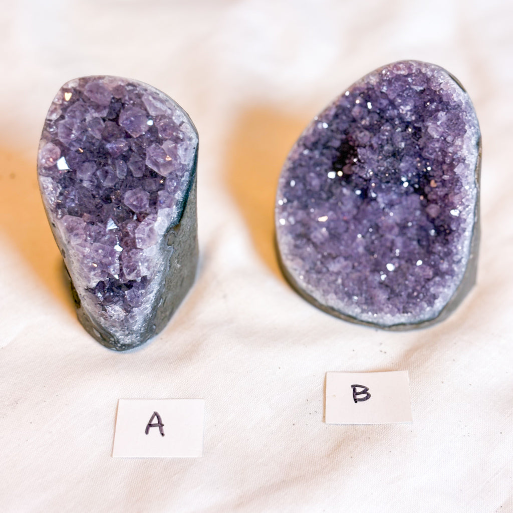 Polished edge amethyst crystal cluster
