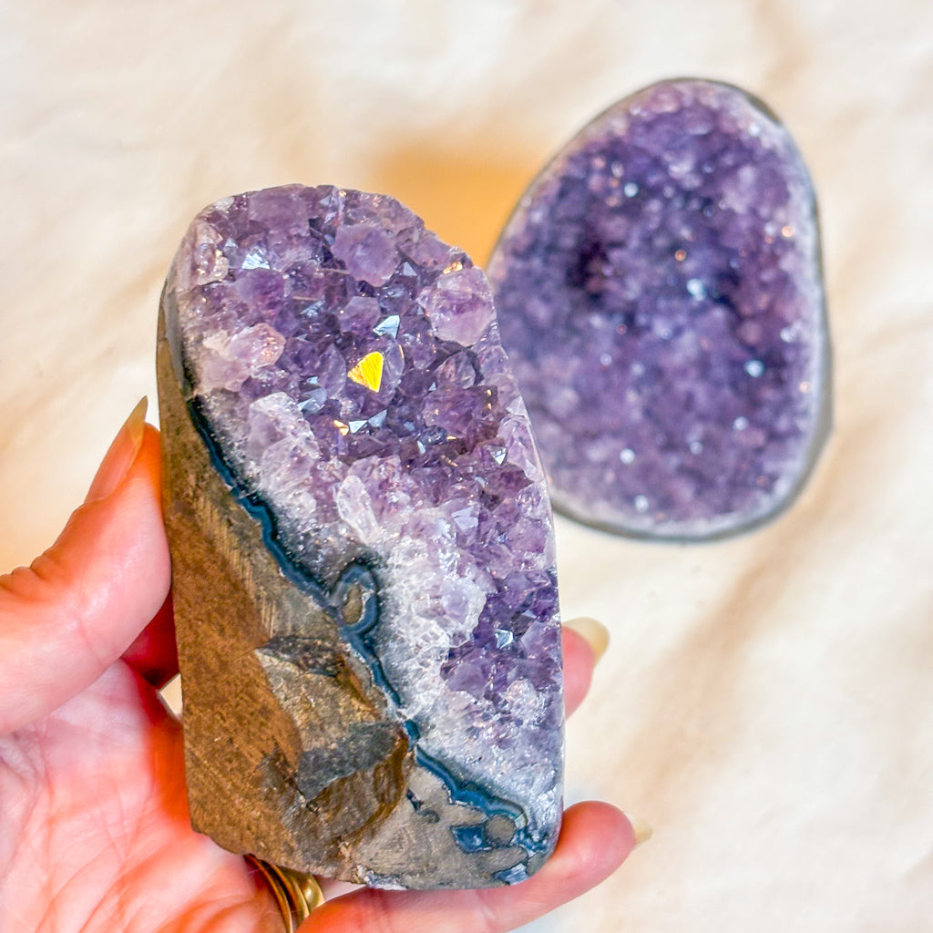 Polished edge amethyst crystal cluster