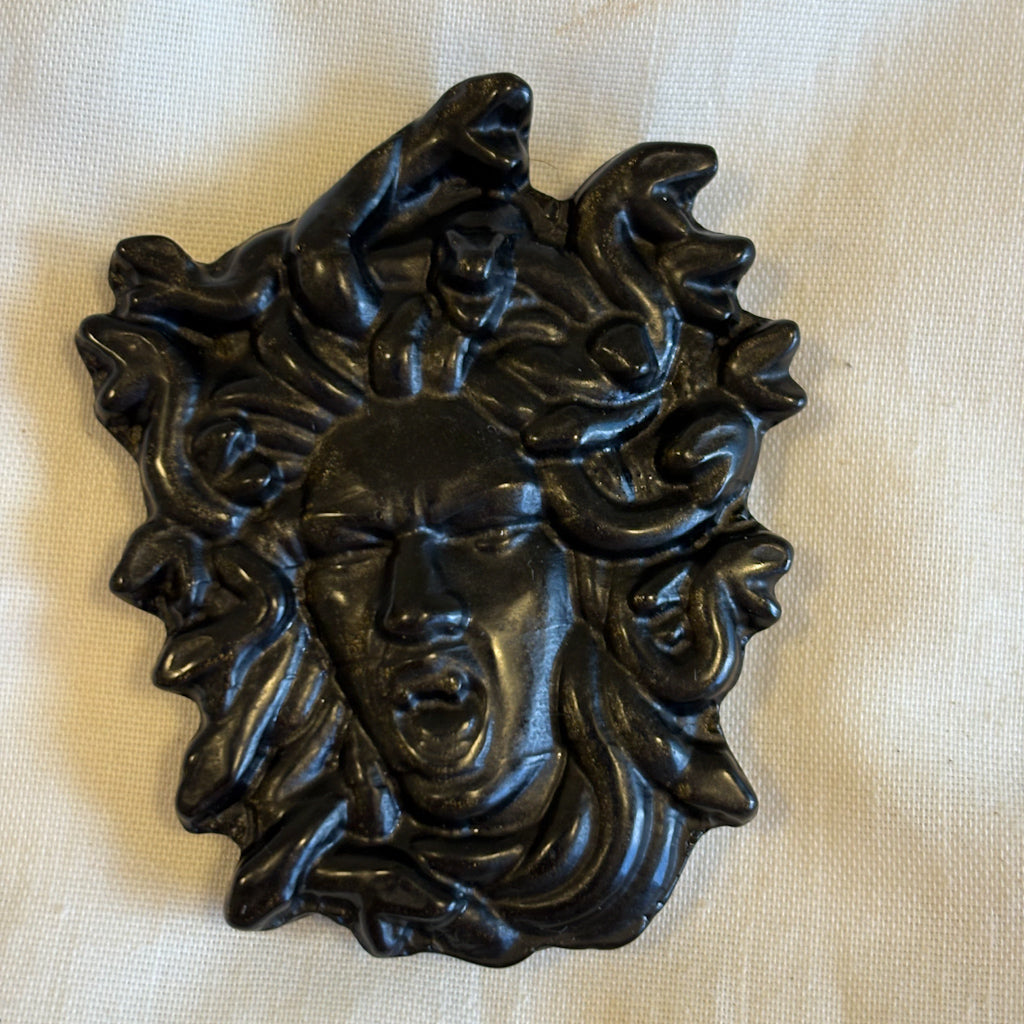 Black obsidian crystal Medusa carving