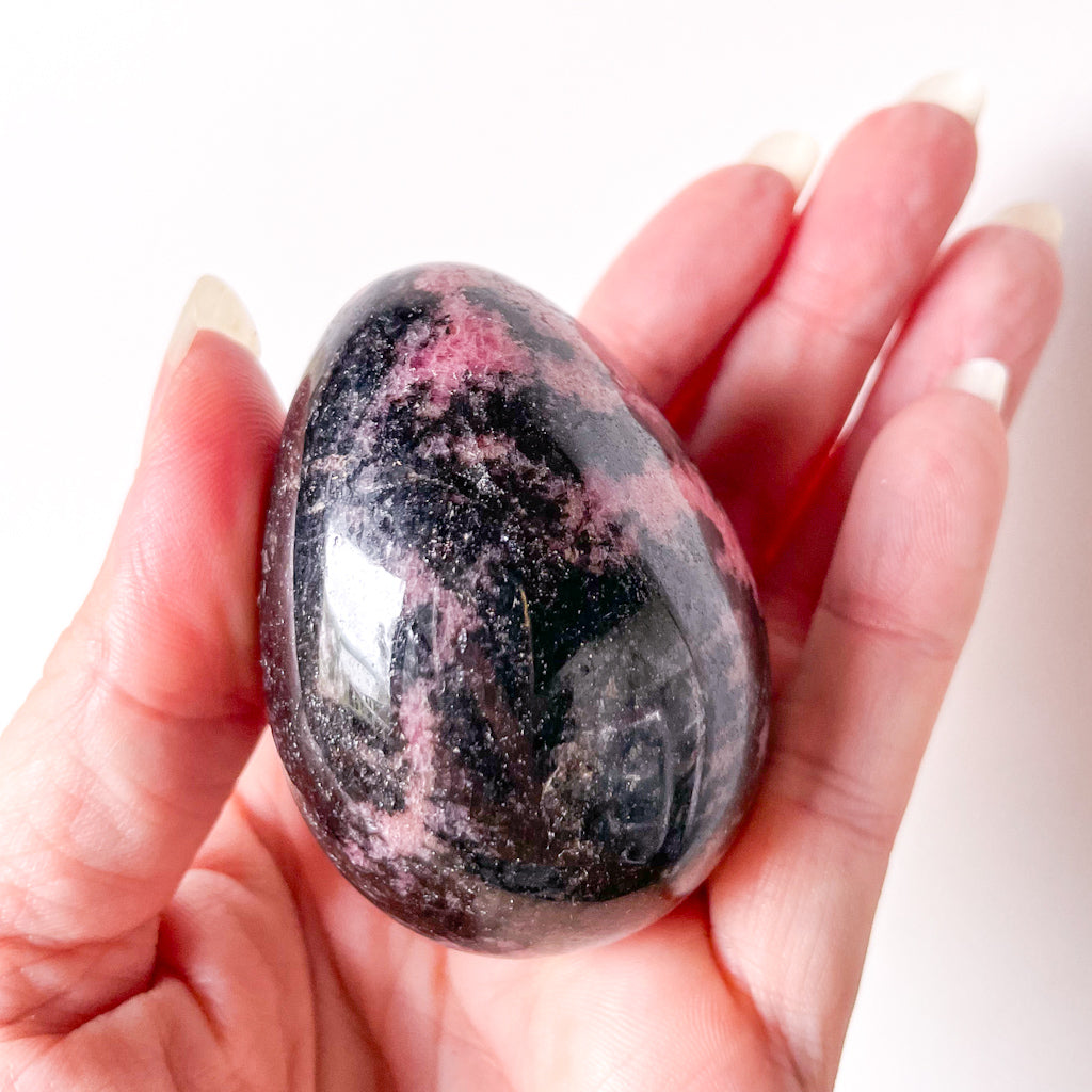 Pink rhodonite crystal egg