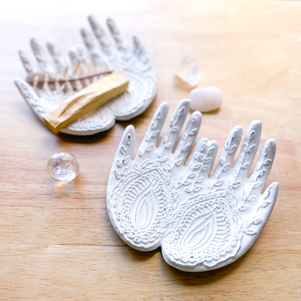 White washed cast iron hamsa buddha hands dish