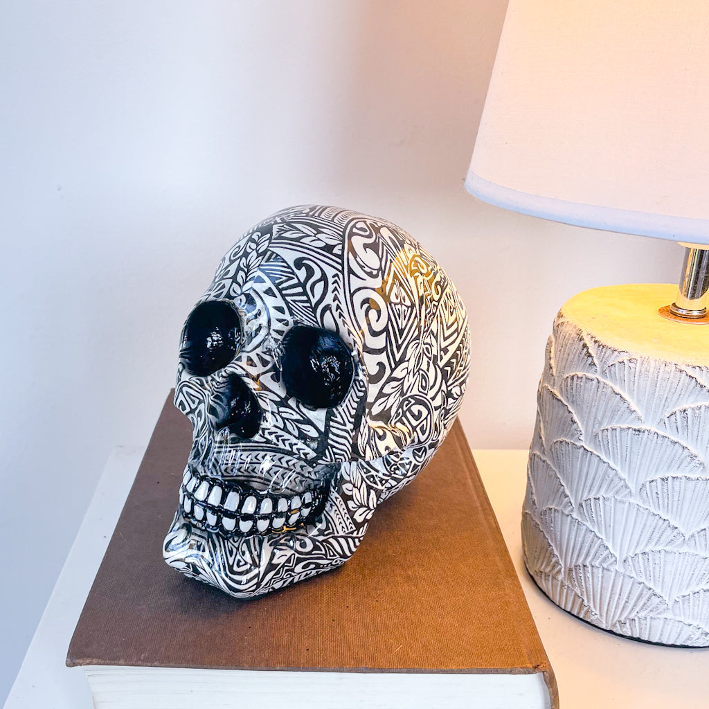 Tribal tattoo skull statue