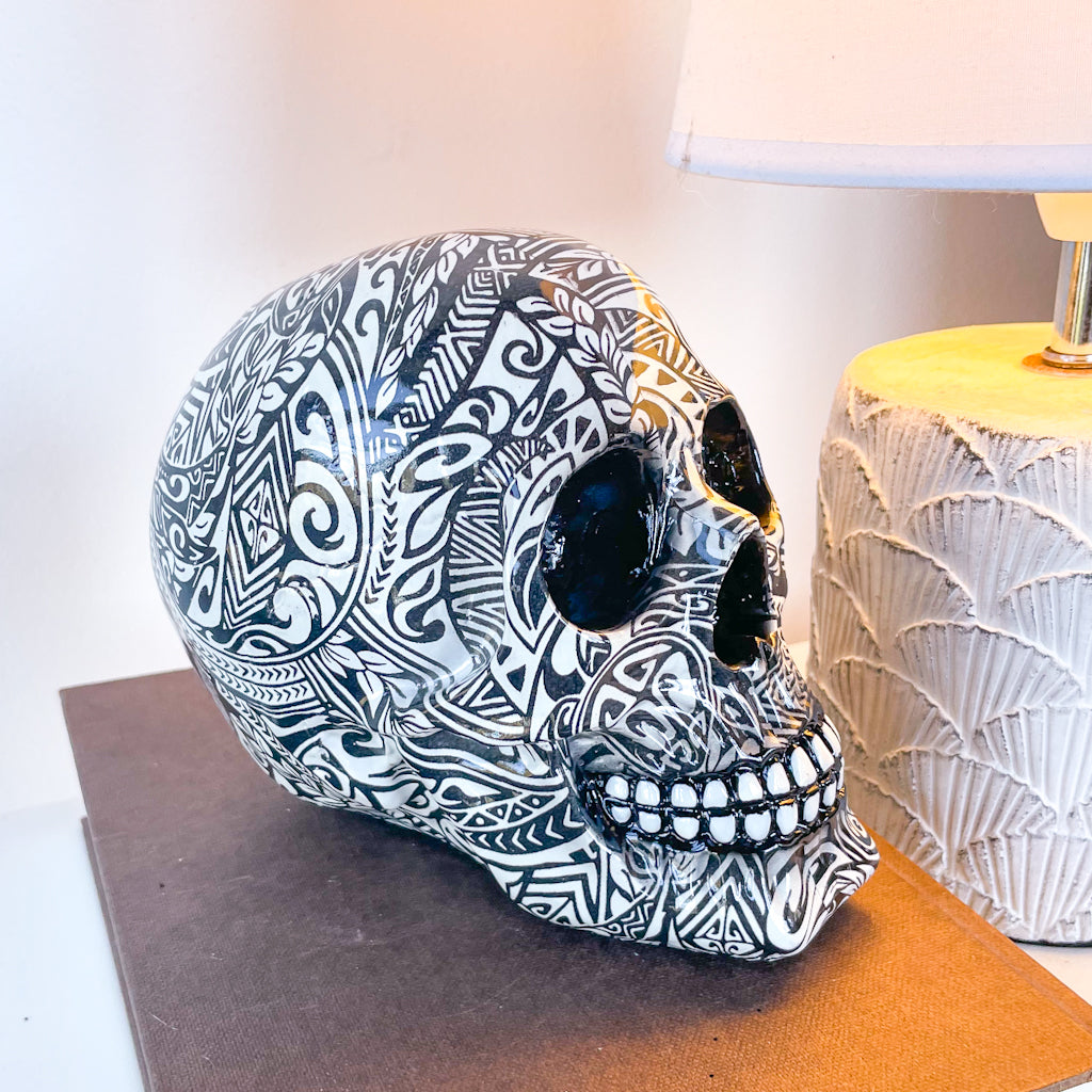 Tribal tattoo skull statue