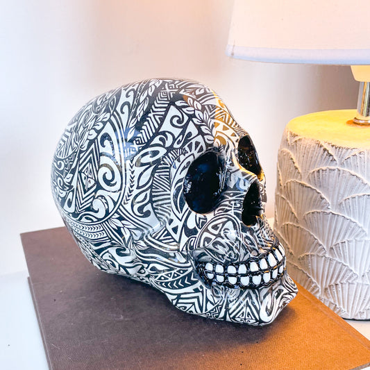 Tribal tattoo skull statue