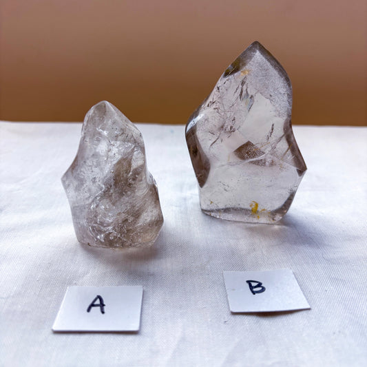 Clear quartz crystal flame statue