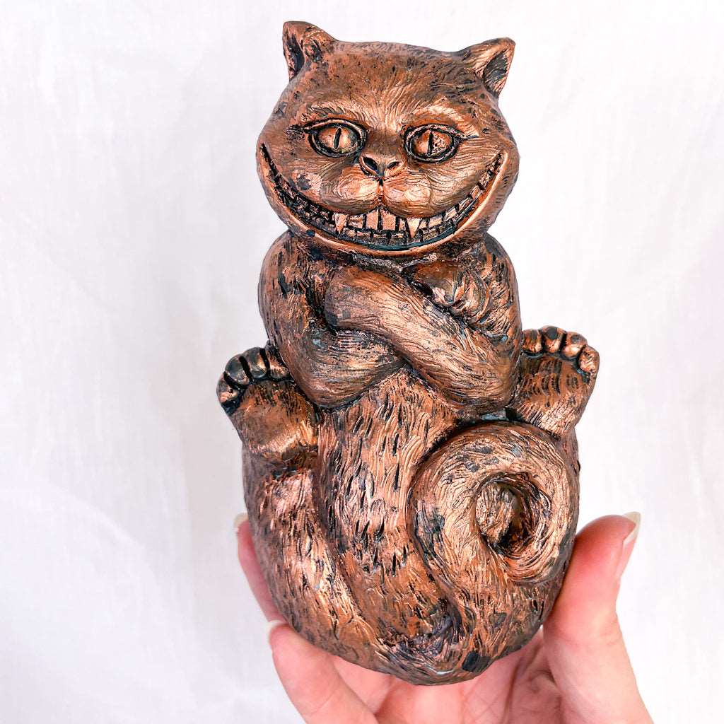 Alice in wonderland Cheshire cat bronze statue