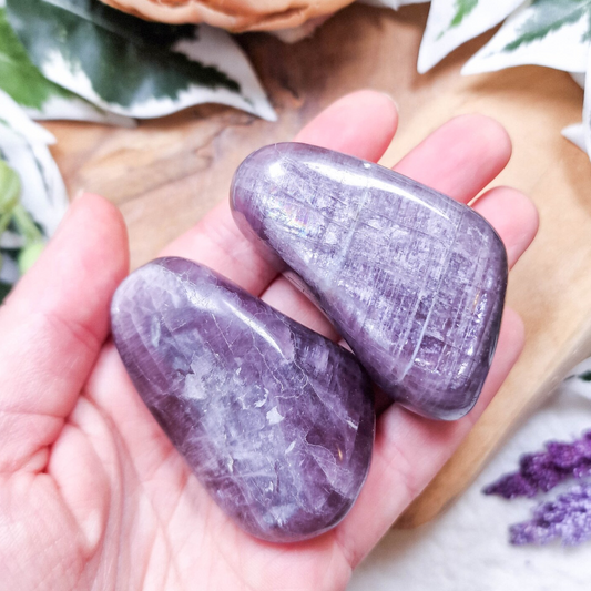 Rare purple anhydrite crystal palm stone