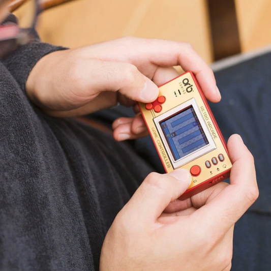 Retro video arcade game - OG Nintendo pocket console style