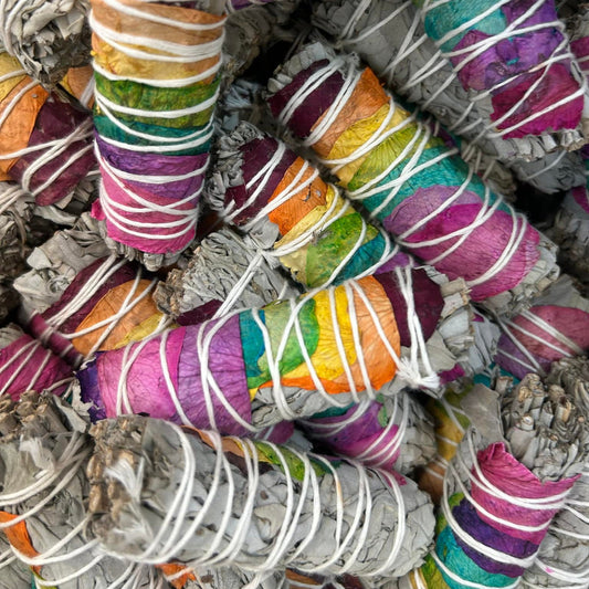 Sage incense smudge stick bundle with chakra flowers