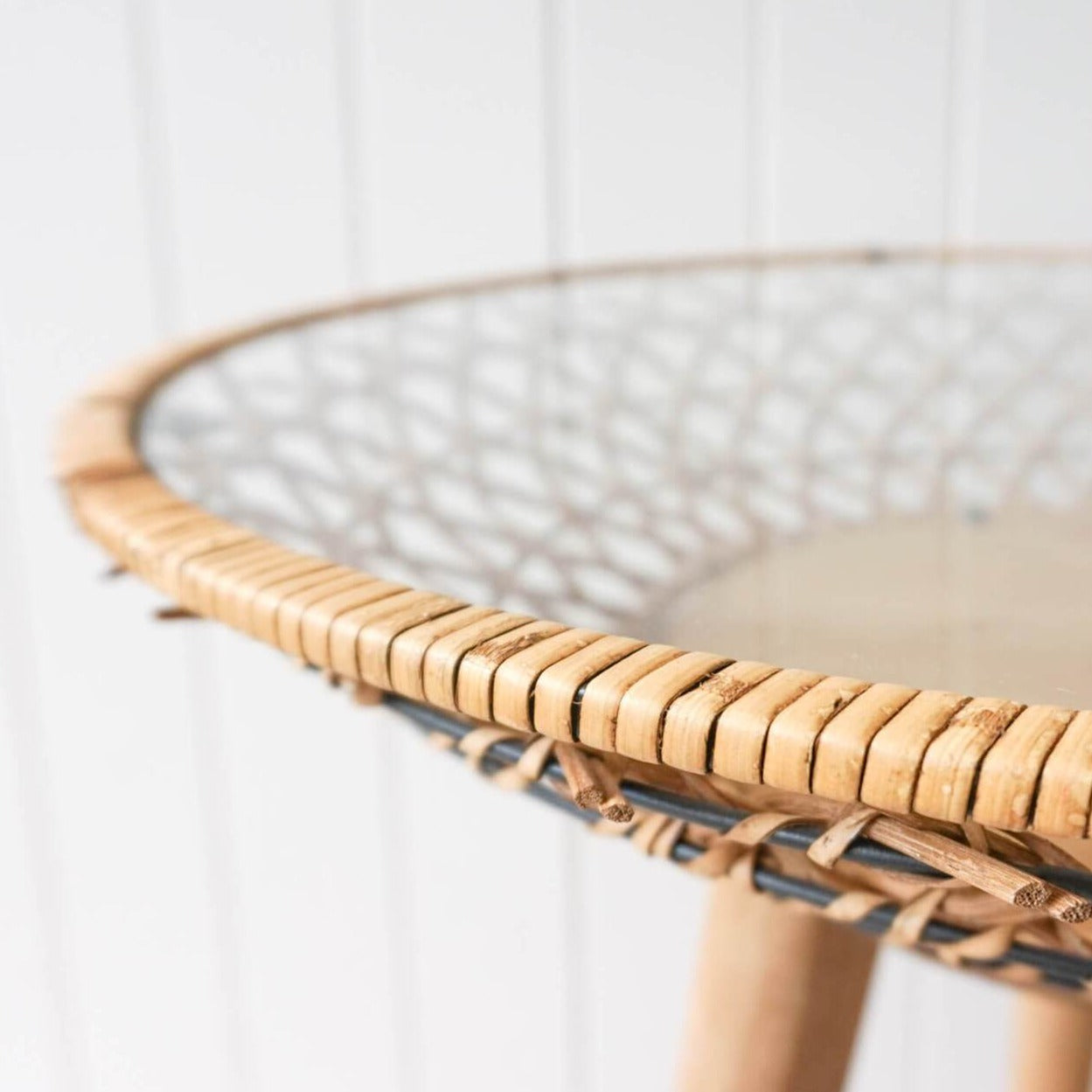 Weaved cane, rattan and glass top display table