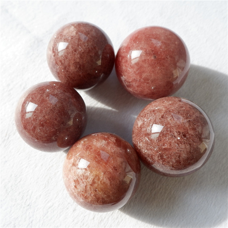 Strawberry quartz crystal sphere