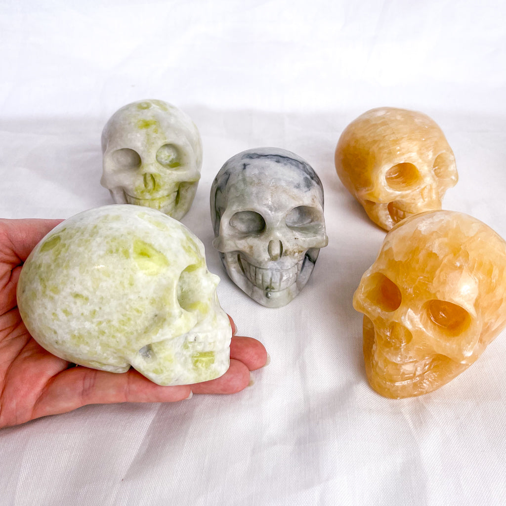 Crystal hand carved skull statue L - calcite or serpentine