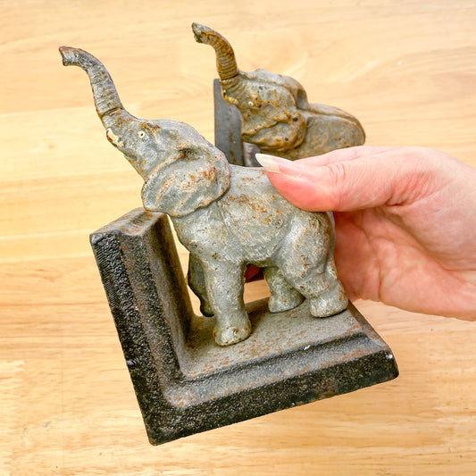 Vintage rusted elephant cast iron bookends pair