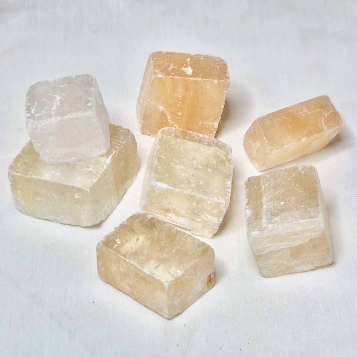 Optical calcite / honey calcite crystal rhomb / slice raw stone