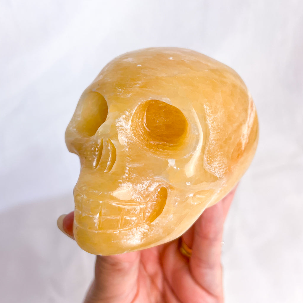 Crystal hand carved skull statue L - calcite or serpentine