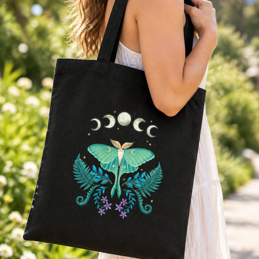 Moon phases moth tote bag