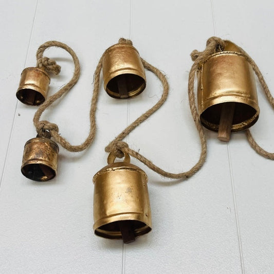 Vintage brass cow bell set 5 on rope