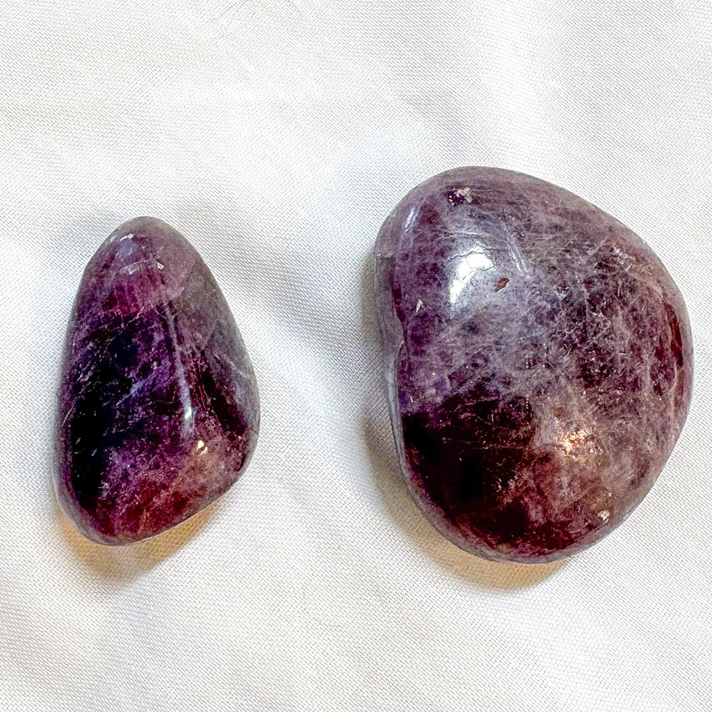 Rare purple anhydrite crystal palm stone