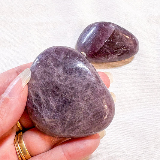 Rare purple anhydrite crystal palm stone