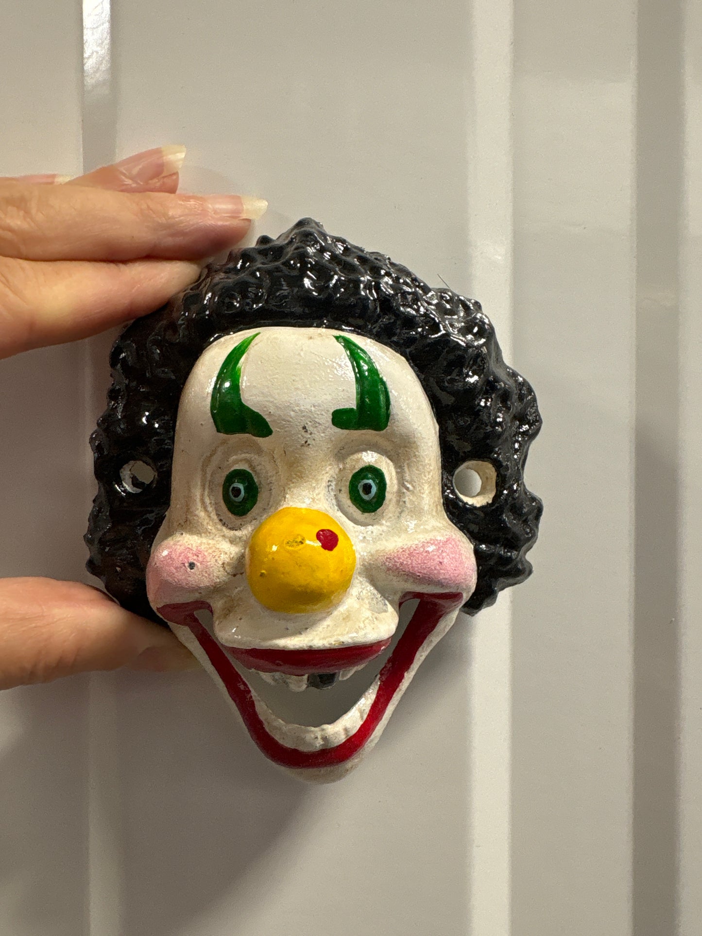 Creepy clown bottle opener hook