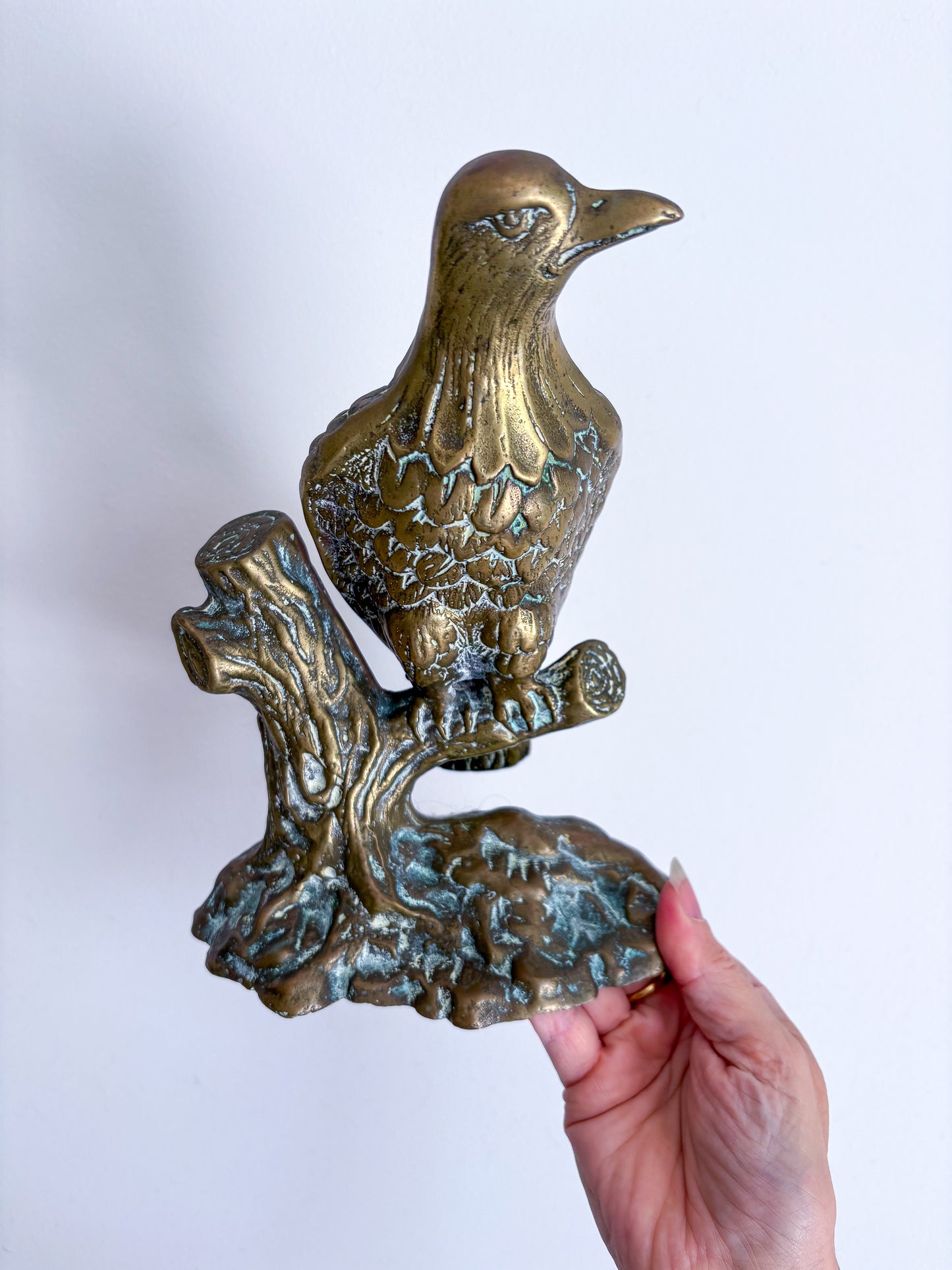 Antique brass eagle statue