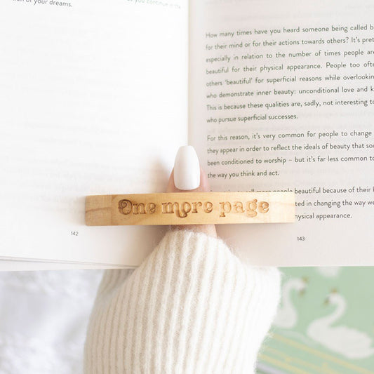 Book worm wooden page holder