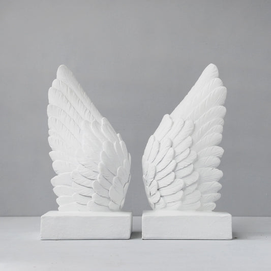 Angel wings bookends statue