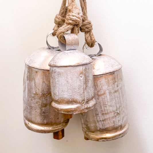Vintage coastal white washed gold iron cow bell