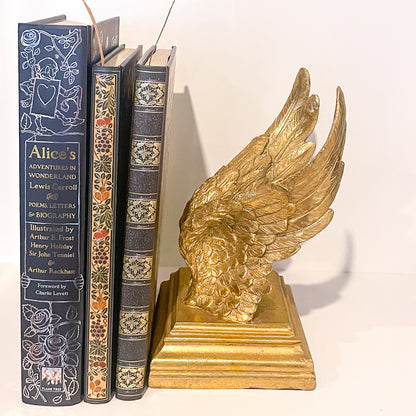 Majestic gold wings bookend statue