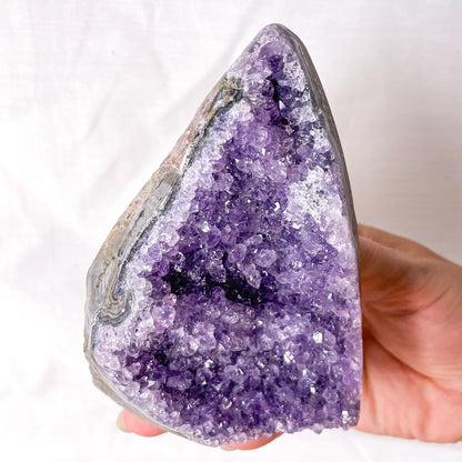 Amethyst crystal polished edge cluster 470g