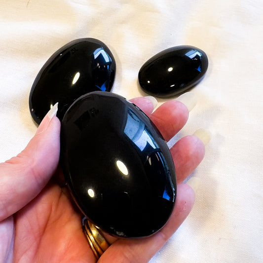 Black obsidian crystal palm stone