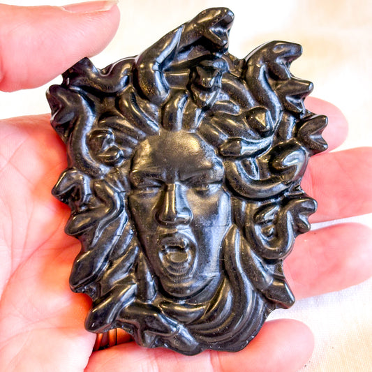 Black obsidian crystal Medusa carving
