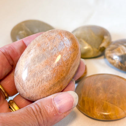 Peach Moonstone crystal palm stone