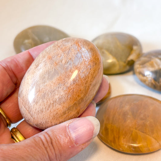 Peach Moonstone crystal palm stone