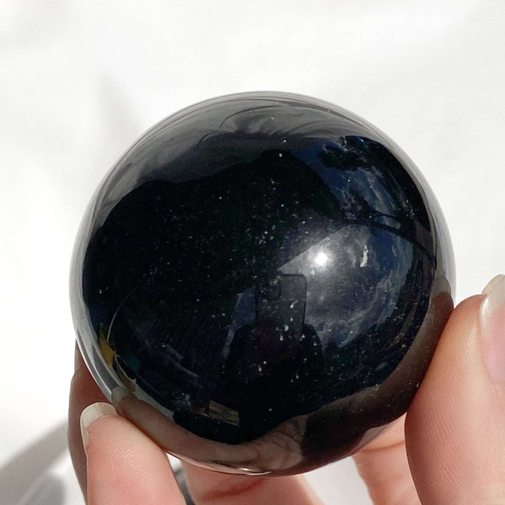 Black obsidian crystal sphere