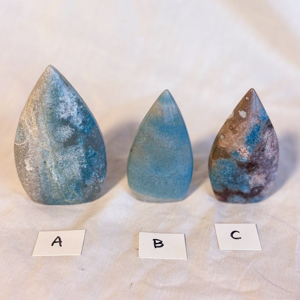 Trolleite crystal carved freeform statue