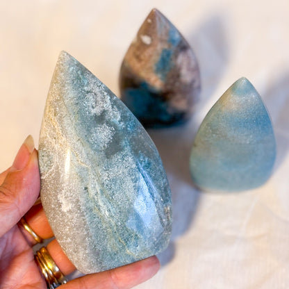 Trolleite crystal carved freeform statue