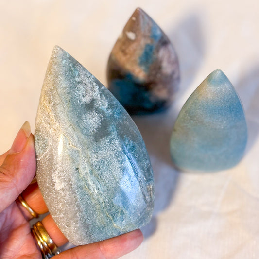 Trolleite crystal carved freeform statue