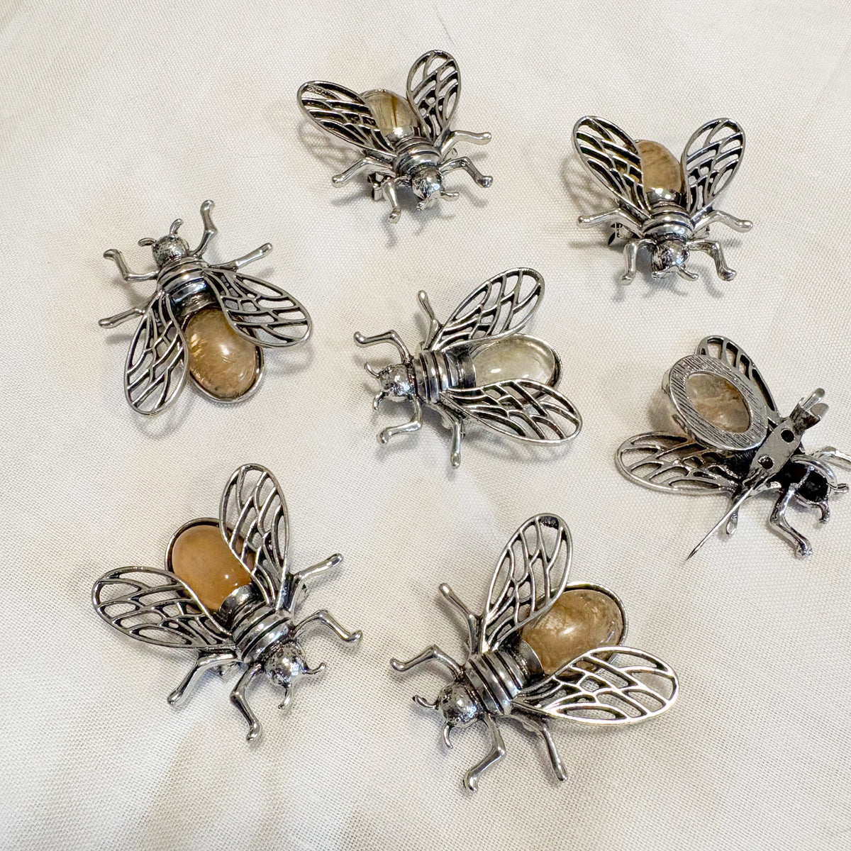 Golden healer quartz crystal bee brooch