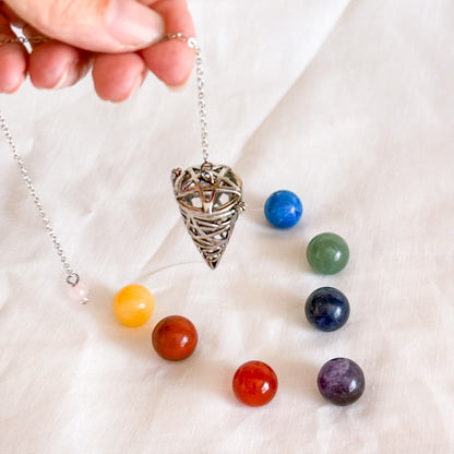 Pentagram pendulum with 7 chakra crystals