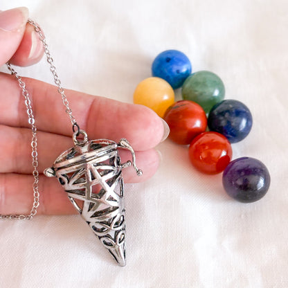 Pentagram pendulum with 7 chakra crystals